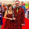 Tina and Sam model with their 2011 Fiery Food Challenge Best of Show award for their Zane & Zack's Stinger sauce
