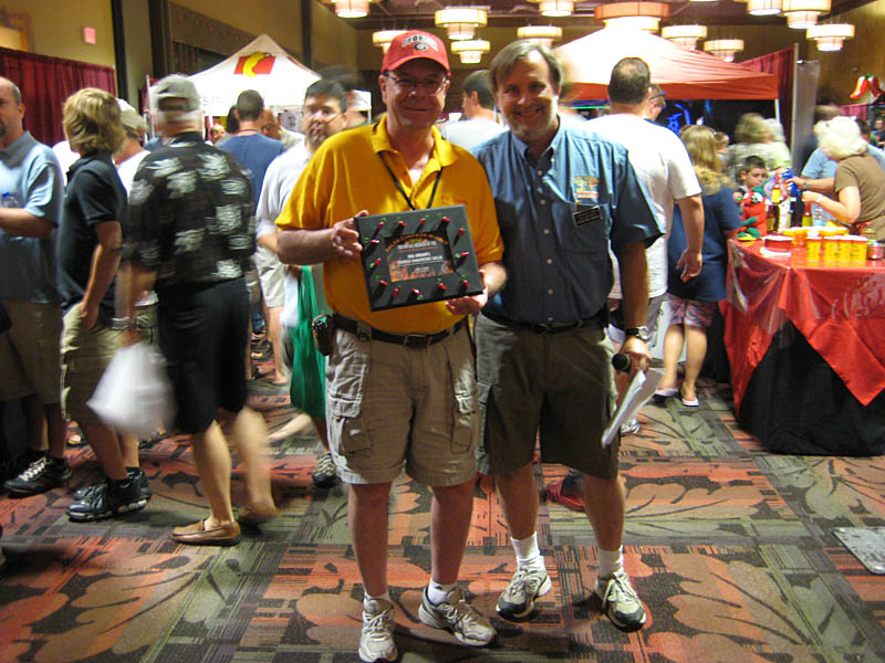 Jim Beckett of Jungle Jim's handing Big Orson's the 2nd Place award