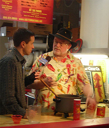 Johnny DiLoretto interviewing John 'CaJohn' Hard at CaJohn's CaBoom! Chili Company eatery in Columbus' North Market. Also located in the North Market is CaJohn's Flavor & Fire hot sauce stand.