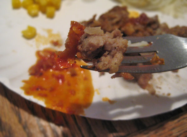 Swazi Fire Chilli Sauce on a bite of meat loaf
