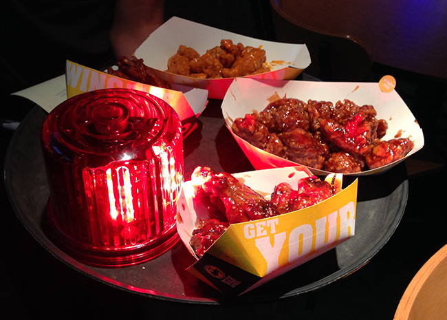 buffalo-wild-wings-new-sauces-ghost-pepper-sauce-salted-caramel-bbq-sauce with lights and siren